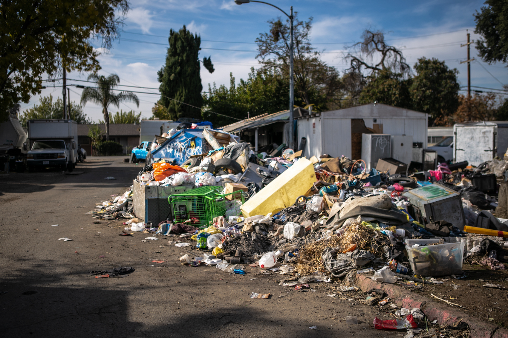 Garbage piles at Stockton Park Village in Stockton on Nov. 22, 2022. Photo by Rahul Lal, CalMatters.